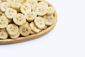 Banana slices in plate on white