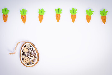 Easter pattern with carrots and cute Easter egg decoration