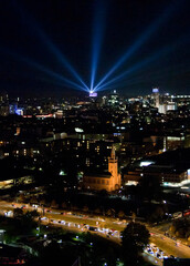 Fototapeta na wymiar Skyline of Berlin at Night with Laser Sky