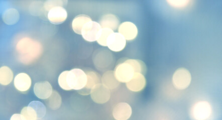 abstract cyan yellow light festive shining background with bokeh effect