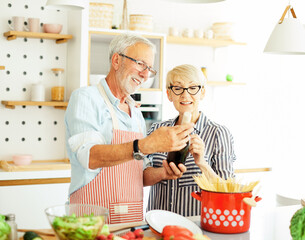 love kitchen senior woman man couple wine looking bottle drink tasting retirement food husband wife together