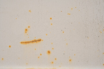 Textured metal surface with detailed corrosion, rust and scratches. Rusty metal wall, painted metal with rust texture. Rusty background with streaks of rust. Rust stains. surface with.