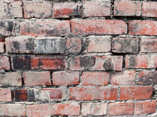 the black ancient brick wall with bright light vantage photo