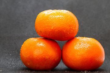 mandarin, fresh fruit black background