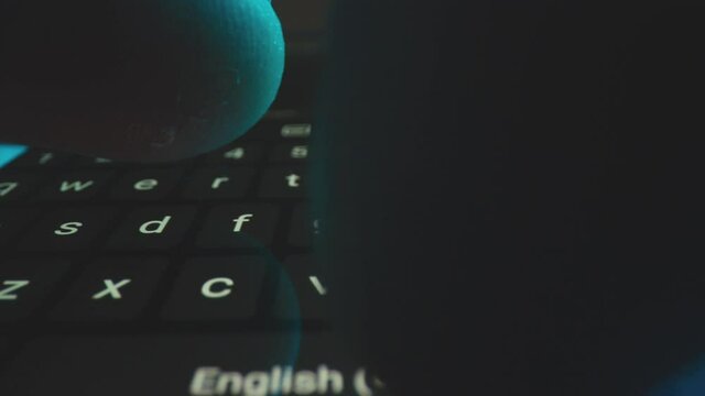 Timelapse of using a smartphone keyboard to type a message. Wide-macro shot.