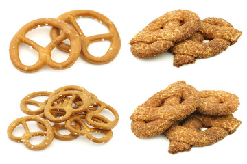 Salty and sweet pretzels on white background