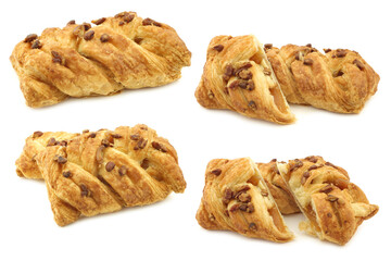 freshly baked pecan buns with apricot filling on a white background