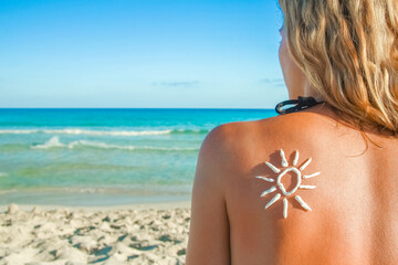 happy girl with the sun on her back by the sea in the nature