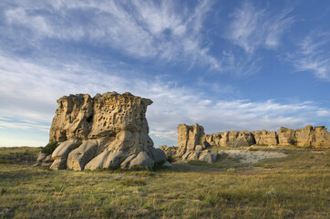 USA, Montana. Sandstone pillars or 'hoodoos' rising from the prairie.