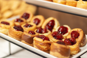 Delicious and beautifully served pastries close-up. Cookies on a plate. Beautiful sweet snacks