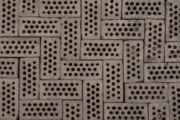 Brick floor with round holes texture