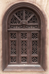 asia style architecture arched wooden carving window texture on imin minaret