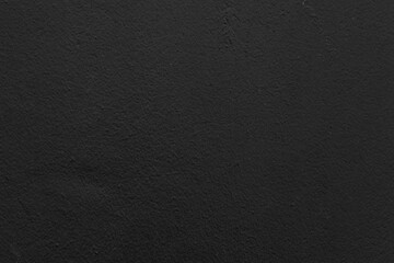 Recycled black paper texture. Light craft paper close up background