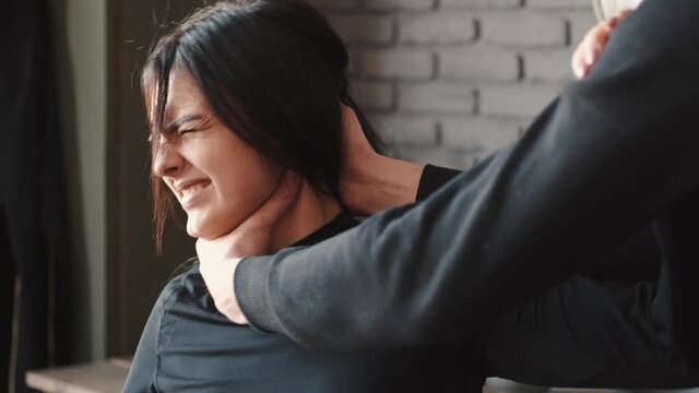 Angry husband beating and choking scared wife at home