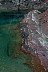 USA, Montana. Rocky outcrop, McDonald Creek, Glacier National Park.