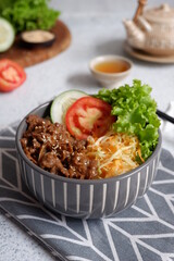 a bowl of teriyaki rice bowl 