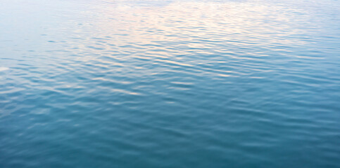 Blue sea waves soft surface abstract background.