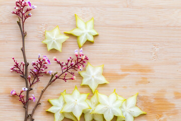 star fruits slice herbal flora of asia for health care arrangement flat lay style on background wooden