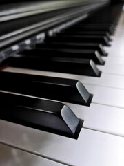 Soft focus : Close up of piano keys. Side view of a musical instrument.
