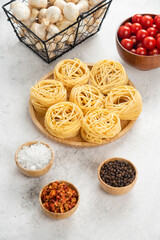 Noodle rolls with mushroom, cherry tomatoes and spices