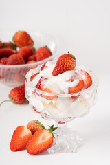 Fresh strawberry fruit salad on pure white background