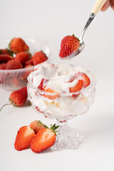 Fresh strawberry fruit salad on pure white background