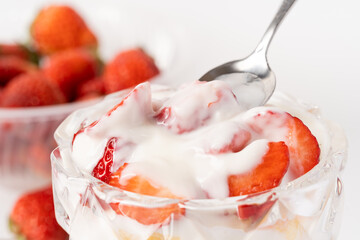 Fresh strawberry fruit salad on pure white background