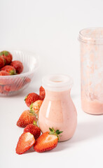 Strawberry milkshake on pure white background