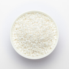 organic white  sago or sabudana big size in white ceramic bowl, Top view