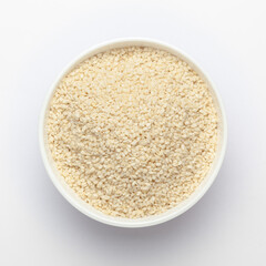 Organic White  Sesame seeds(Sesamum indicum) polished or white Til without shell in white ceramic bowl