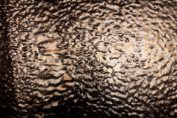 Ice on a black metal background.