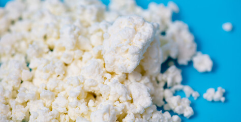 Milk curd on a blue background.