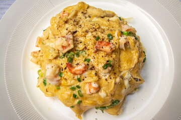 Omelet with rice is a Thai food that is decorated within plate beautifully and It is a popular food.