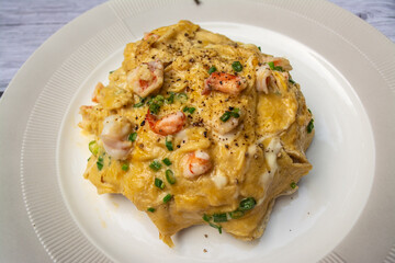 Omelet with rice is a Thai food that is decorated within plate beautifully and It is a popular food.