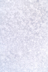 The texture of soap foam with small bubbles.