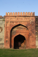 Wall of Red Fort (Lal Qila) Delhi - World Heritage Site. Inside view of the Red Fort, ancient tower of red stone in the fortress the dom