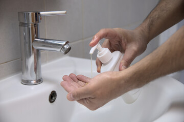 Washing your hands with soap as a preventive measure for covid-19.