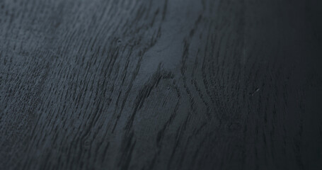 black painted oak surface closeup