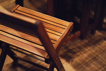 Wooden furniture as patio decoration and home decor closeup