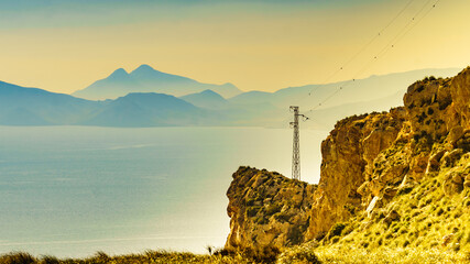High voltage towers on spanish coast