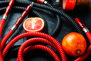 Fototapeta premium Shisha hookah with orange