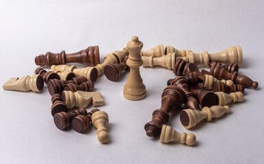 Winner in chess among fallen and scattered losers
