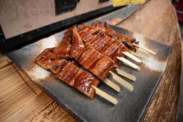 BBQ fish as snack in Osaka, Japan.