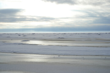 sea covered with ice. winter seascape in blue tones