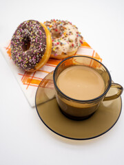 cup of coffee and donuts