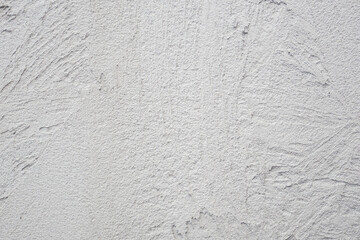 Decorative plaster. Grey wall texture background. Concrete style. Restoration indoors. Maintenance works. Renovation at home.