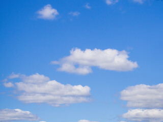 Fototapeta premium white fluffy clouds in the blue sky