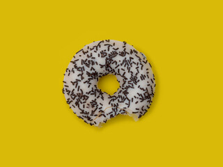 Colorful delicious donut in a row, bitten
