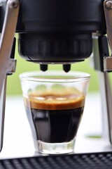 ฺBarista preparing coffee by manual alternative method, brewing process.