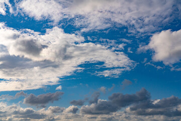 Gray and white clouds on blue sky